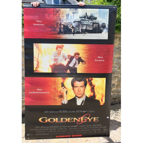 169 - James Bond 007 Goldeneye (1995) double sided banner, 115 cm wide, a Cut Throat Island banner, and a ... 