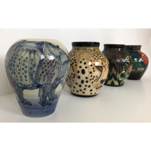 300 - A Dennis Chinaworks vase, decorated a tiger, 8 cm high, and three others (4)