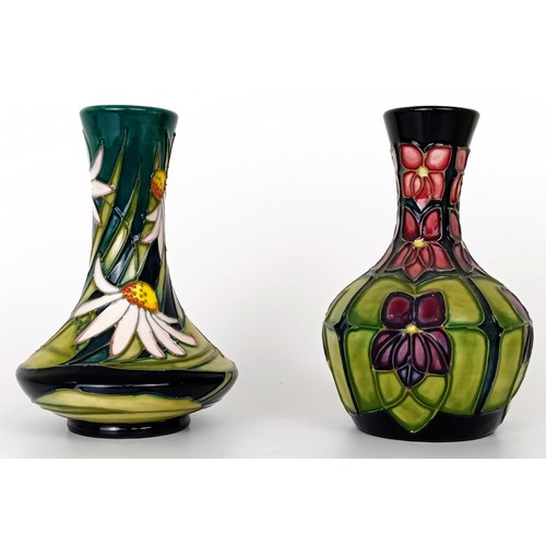 348 - A Moorcroft vase, decorated flowers, 10 cm high, two others, and a Moorcroft box (4)