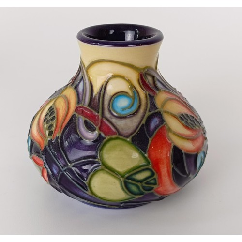 354 - A miniature Moorcroft vase, decorated flowers, 6 cm high, and two others (3)