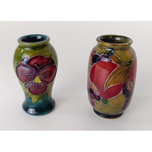 355 - A miniature Moorcroft vase, decorated flowers, 5 cm high, and three others (4)