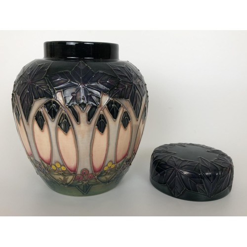 321 - A Moorcroft ginger jar and cover, decorated trees, 15 cm high