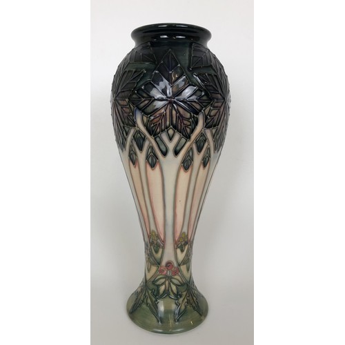 308 - A Moorcroft vase, decorated trees, 29 cm high