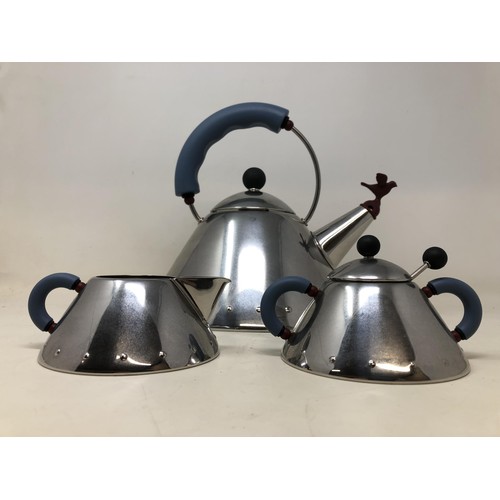 397 - An Alessi three piece tea set, comprising a teapot, a sugar bowl and a milk jug (3)