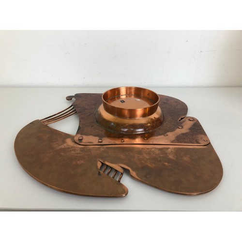 409 - An unusual copper tray, inset with a hardstone, 43 cm wide, and two vases, 28 cm high, initialled SF... 