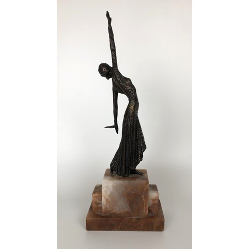 416 - An Art Deco style bronze figure, of a woman, on a marble base, 40 cm high