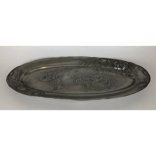 421 - An early 20th century Kayserzinn pewter dish, decorated fish, 55 cm wide