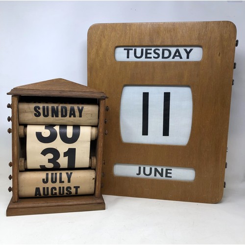 450 - An Art Deco shop calendar, with day, date and month dials, in a wooden case, 45 x 36 cm, reportedly ... 