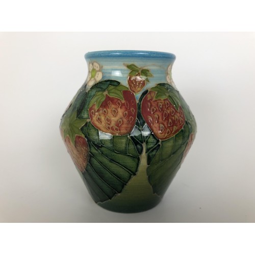 379 - A Dennis Chinaworks vase, decorated strawberries, 10 cm high, and three others (4)