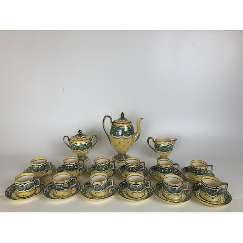 431 - A Wedgwood coffee set, decorated by Stella Lustre, comprising twelve cups and saucers, milk jug, sug... 