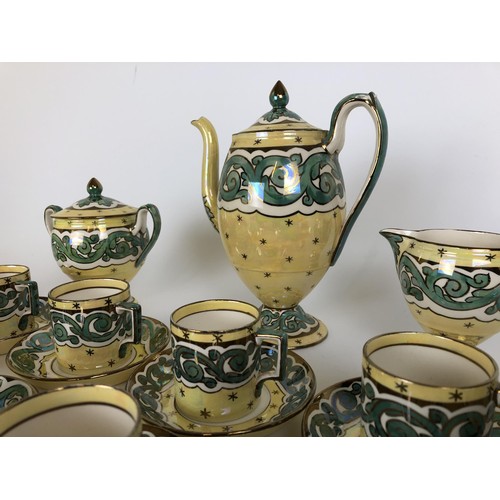 431 - A Wedgwood coffee set, decorated by Stella Lustre, comprising twelve cups and saucers, milk jug, sug... 