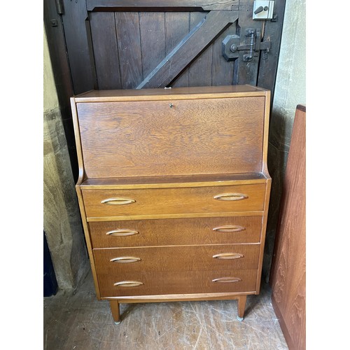 496 - A mid 20th century teak bureau, 76 cm wide and a set of four dining chairs (5)