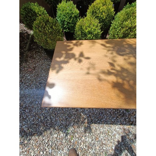 502 - A Cotswold school oak dining table, the top, 126 x 66 cm