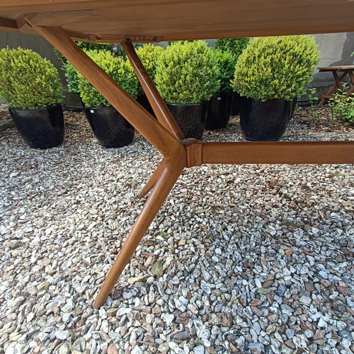 501 - A 1970s teak dining table, the top 138 x 176 cm