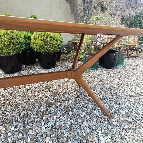 501 - A 1970s teak dining table, the top 138 x 176 cm