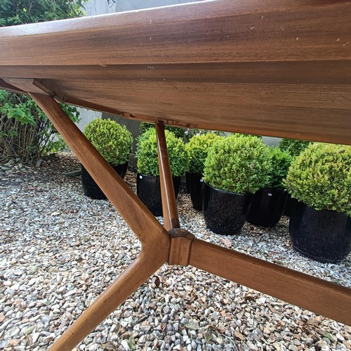 501 - A 1970s teak dining table, the top 138 x 176 cm