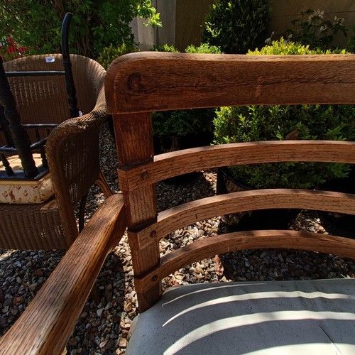 485 - A 1920s oak armchair, 52 cm wide