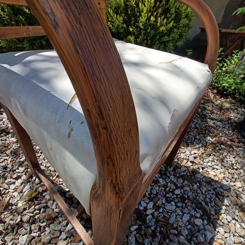 485 - A 1920s oak armchair, 52 cm wide