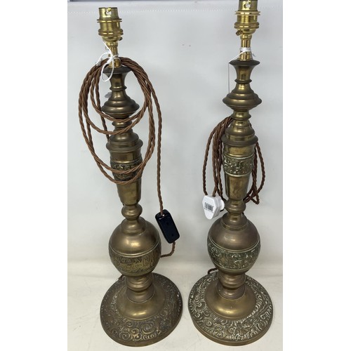 1206 - An Islamic vase and cover, converted to a lamp base, 54 cm high, and a pair of brass lamp bases, 66 ... 