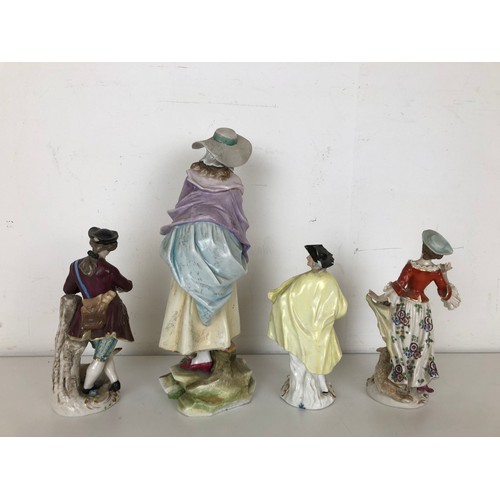 1262 - A Dresden figure of a man, with an attendant dog, 15 cm high, and three other Dresden figures (4)