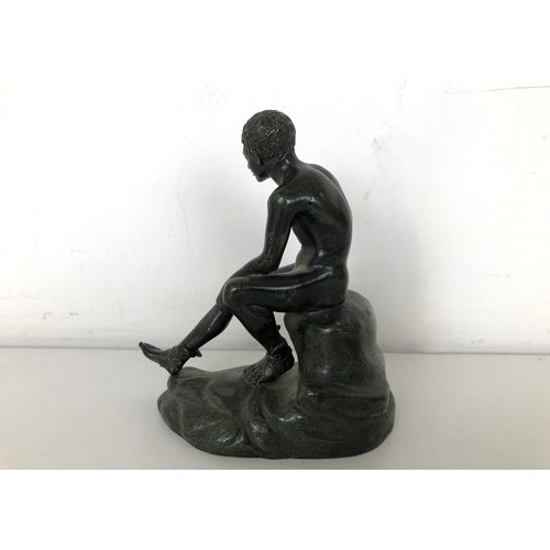 1297 - A bronze figure of an athelete, 10 cm high