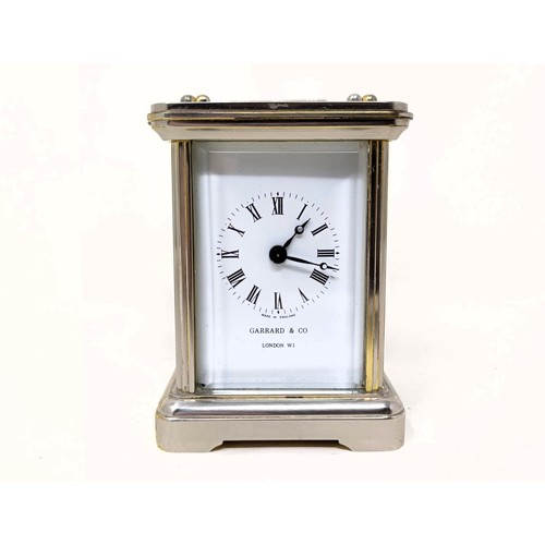 1296 - ***Withdrawn*** A miniature carriage clock, by Garrard & Co, in a silver plated case, 10 cm high