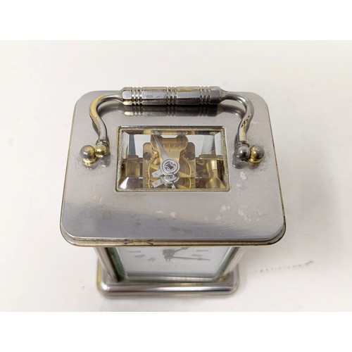 1296 - ***Withdrawn*** A miniature carriage clock, by Garrard & Co, in a silver plated case, 10 cm high