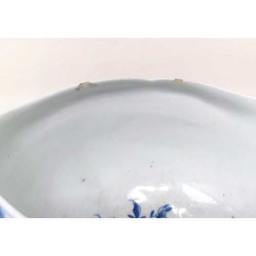 1294 - A blue and white porcelain sauce boat, decorated figures in a landscape, 18 cm