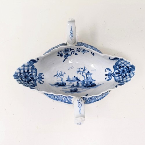 1272 - A porcelain blue and white double ended sauce boat, Roderick Jellicoe label, 20 cm