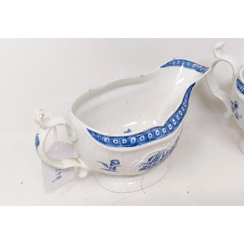 1273 - A pair of Worcester porcelain blue and white sauce boats, decorated flowers, open crescent mark to b... 