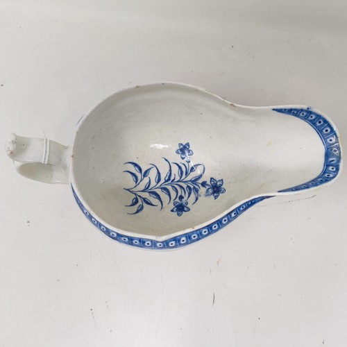 1273 - A pair of Worcester porcelain blue and white sauce boats, decorated flowers, open crescent mark to b... 