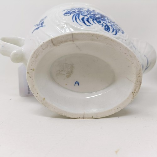 1273 - A pair of Worcester porcelain blue and white sauce boats, decorated flowers, open crescent mark to b... 