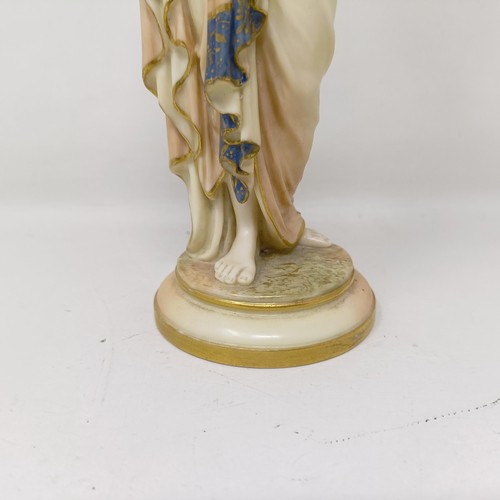 1258 - A Royal Worcester blush ivory classical figure holding an urn, 24 cm high