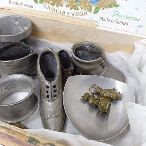 1322 - A novelty cigar piercer, in the form of a lady on a chamber pot, and assorted other metalwares