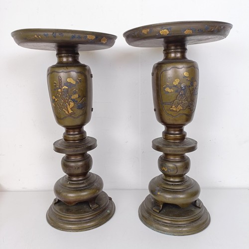 1311 - A pair of Japanese bronze stands, decorated figures, converted to lamps, 46 cm high