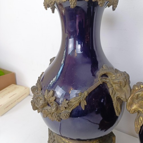 1304 - A pair of French blue glazed vases, with gilt metal mounts, converted to lamps, 52 cm high