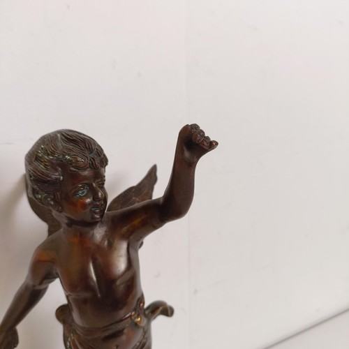 1307 - A bronze figure of a cherub, 35 cm high