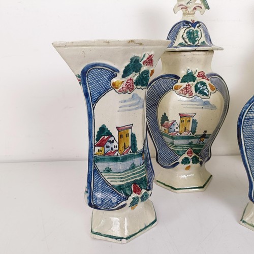 1298 - A Delft polychrome garniture, comprising two vases and covers and three vases