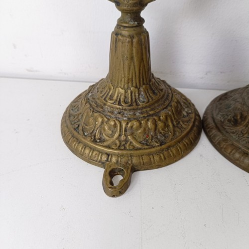 1314 - A set of four brass gimbal wall lights, 25 cm high