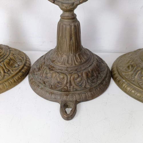 1314 - A set of four brass gimbal wall lights, 25 cm high