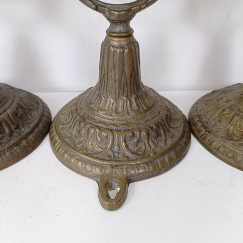 1314 - A set of four brass gimbal wall lights, 25 cm high