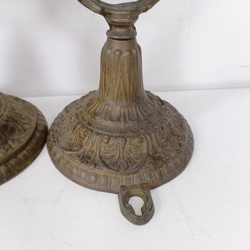 1314 - A set of four brass gimbal wall lights, 25 cm high