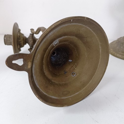 1314 - A set of four brass gimbal wall lights, 25 cm high