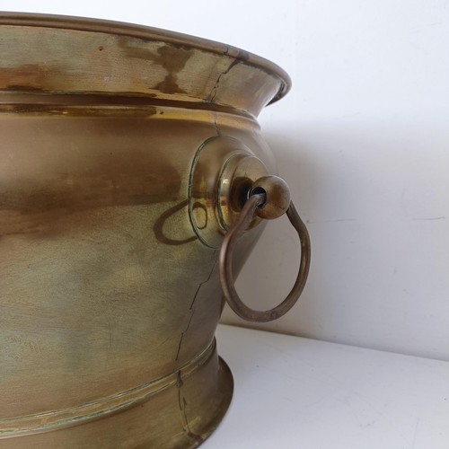 1318 - A brass wine cooler, 50 cm wide