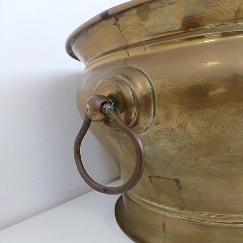 1318 - A brass wine cooler, 50 cm wide