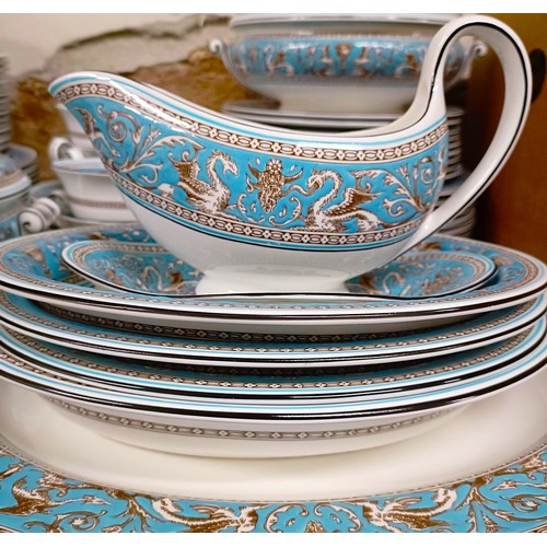 1215 - A Wedgwood Florentine pattern part dinner service (qty)