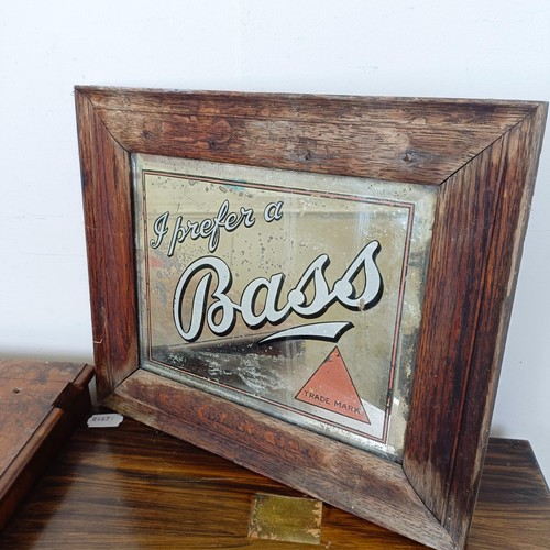 1232 - A vintage Bass pub wall mirror, 30 x 33 cm, a writing box, and a walnut chest, having two drawers (3... 