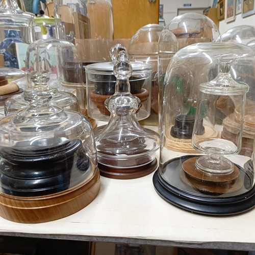 1251 - A pair of glass vases and covers, 30 cm high, and assorted glass domes and bases (qty)