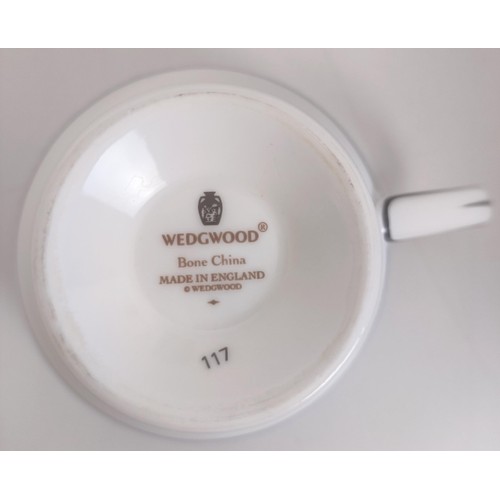 1218 - A Wedgwood Florentine pattern dinner service (qty)