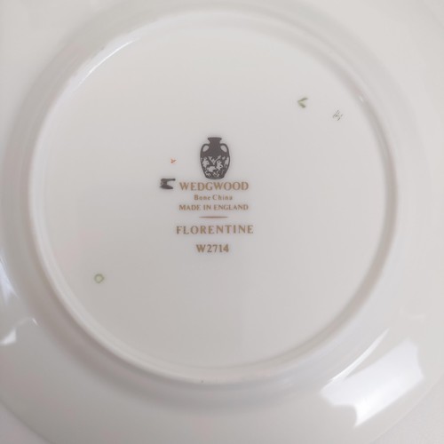 1218 - A Wedgwood Florentine pattern dinner service (qty)